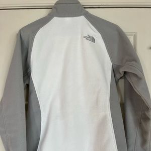 The North Face fleece jacket. White and gray. Ladies size medium.